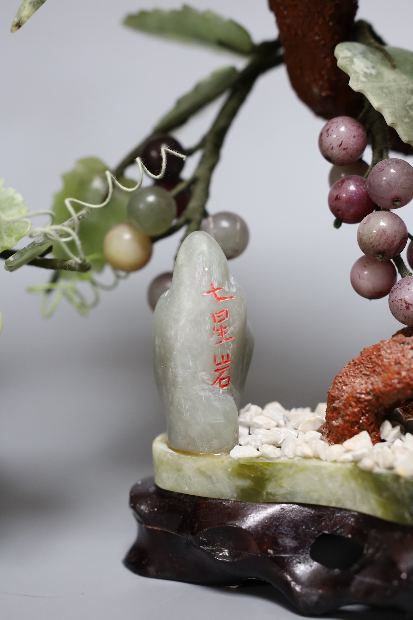 Two Chinese hardstone model trees, peach tree 27cms high
